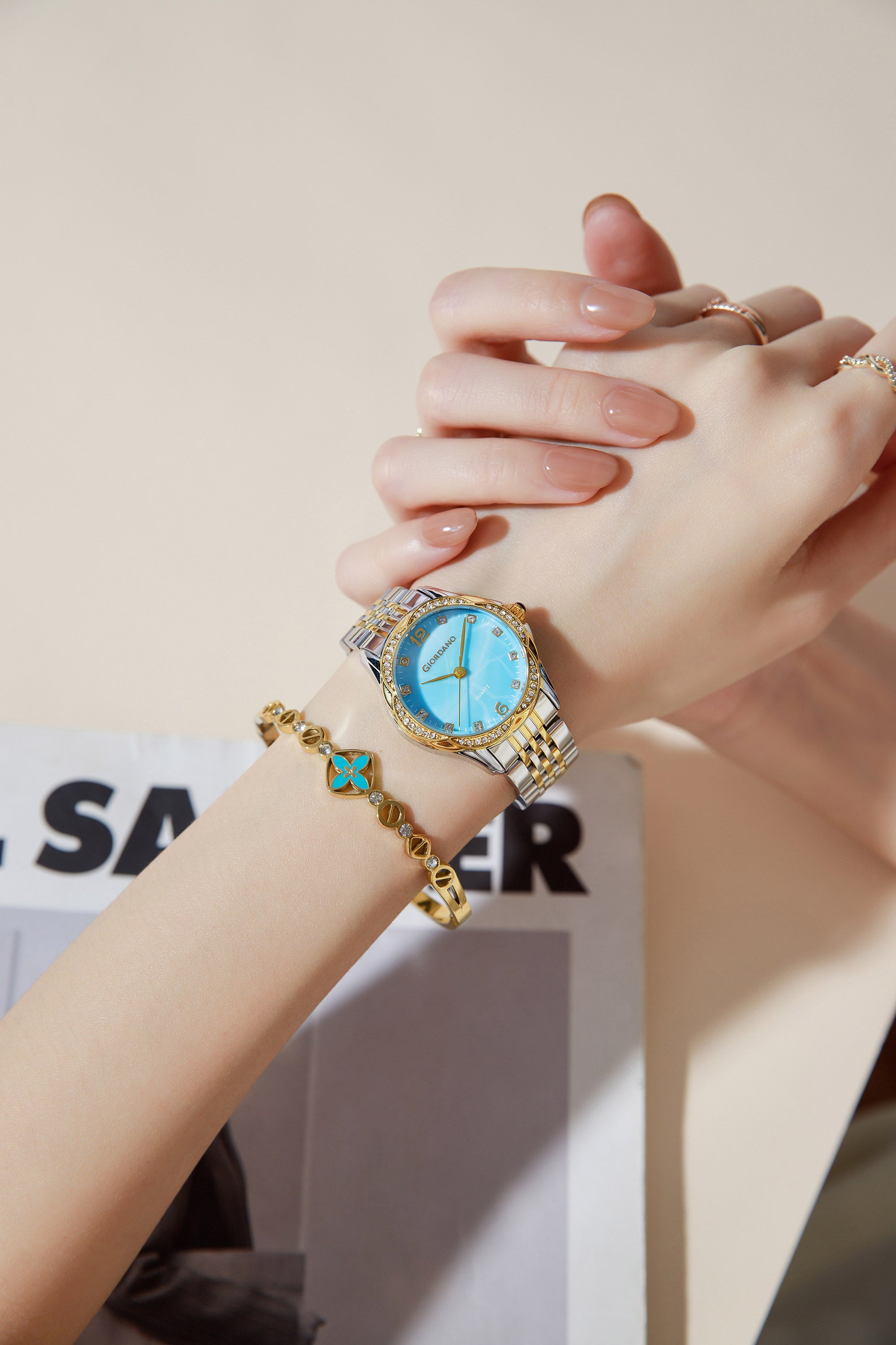 Giordano Analog Quartz Watch for Women with Textured Round Blue Dial, Flower shape case, Blue Crown, Crystal studded hour markers and bezel, Silver and Gold Stainless Steel Strap - GZ-60157-44