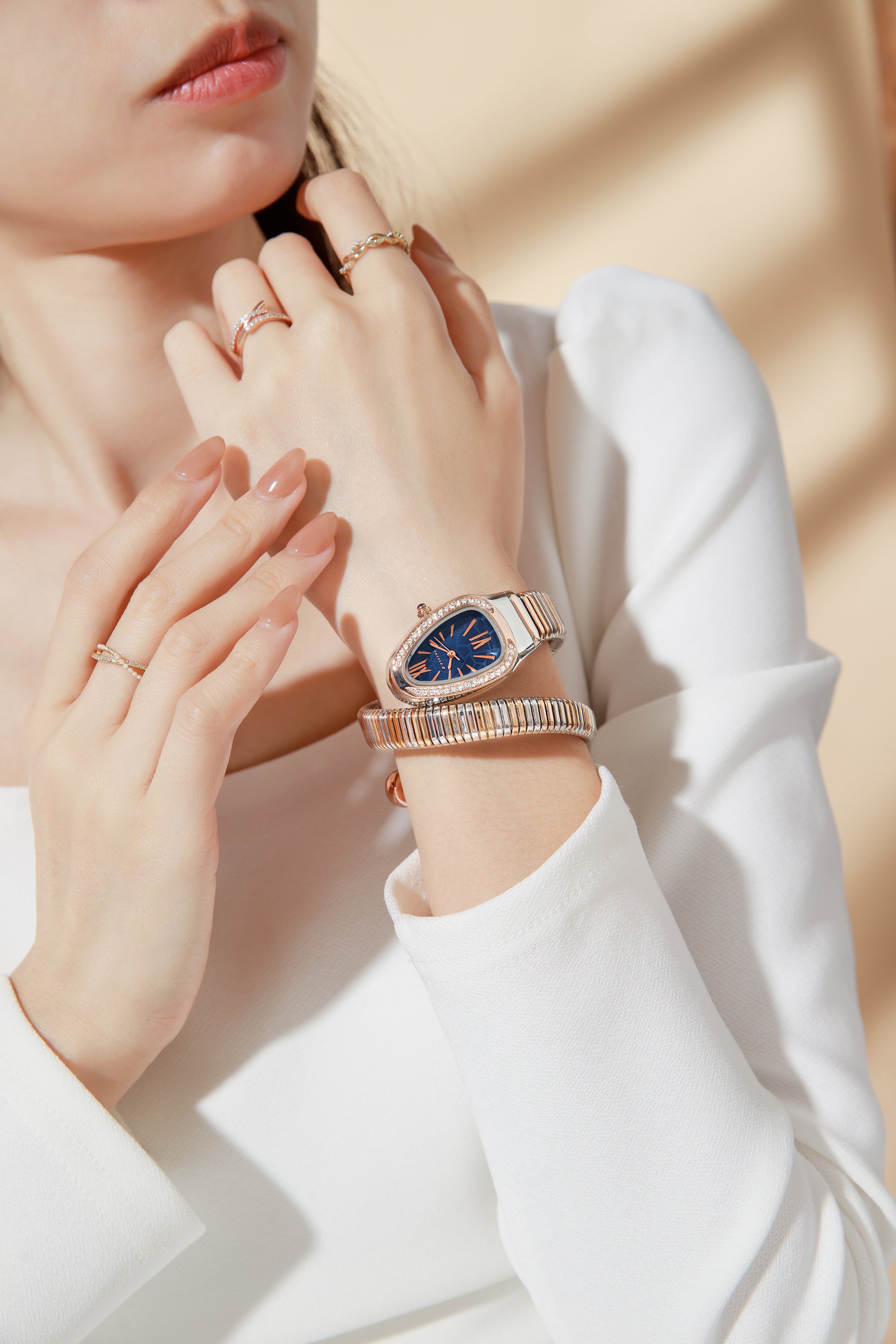 Giordano Serpentine Collection Analog Quartz Watch for Women with Blue Geometric-Textured Dial, Crystal-Studded Bezel, Roman Numerals & Snake-Style Wrap-Around Stainless Steel Strap - GZ-60189-22