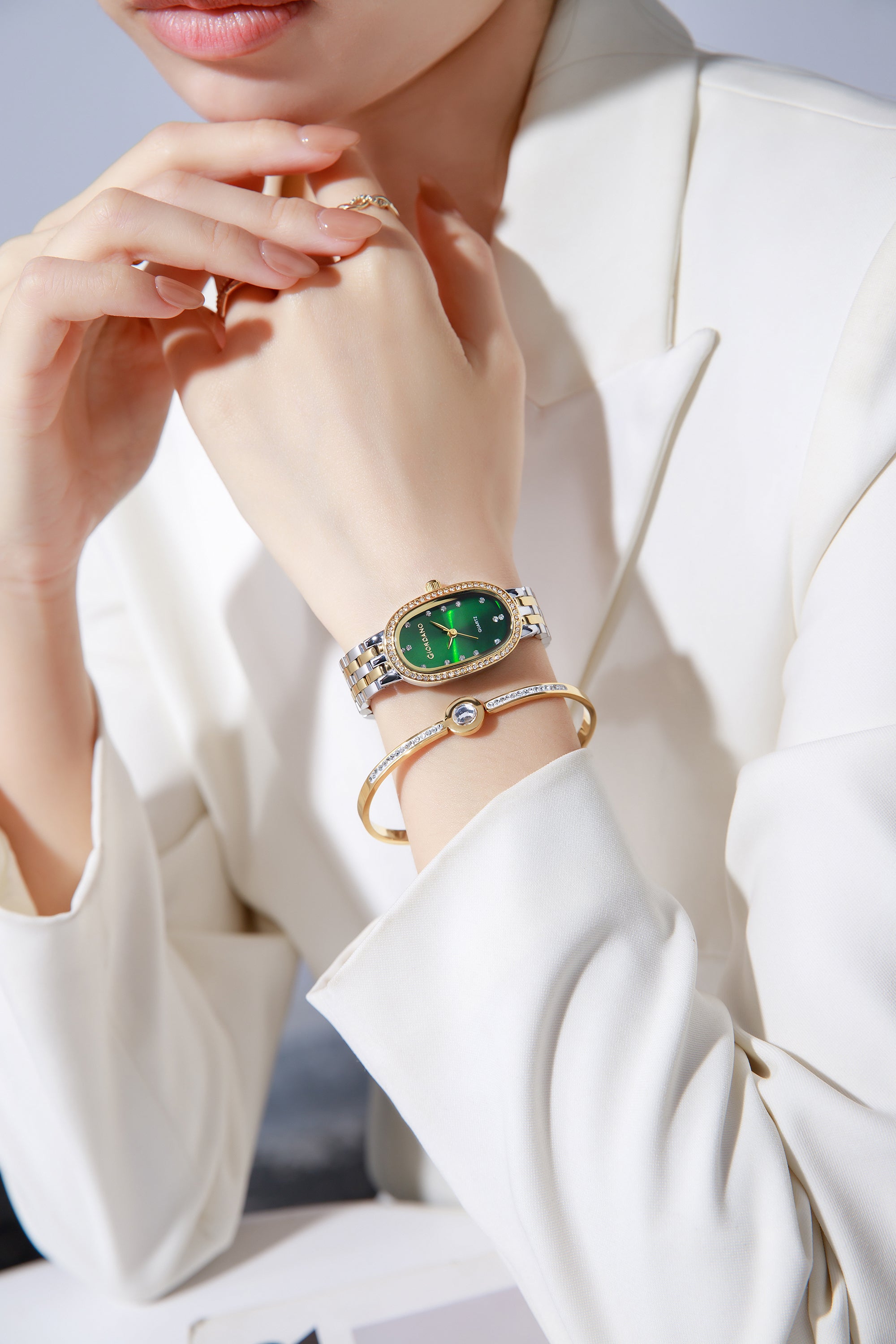 Giordano Analog Quartz Watch for Women with Bangle Oval Green Dial, Blue Crown, Crystal Studded Hour Markers and Bezel, Silver and Gold Stainless Steel Strap - GZ-60153-33