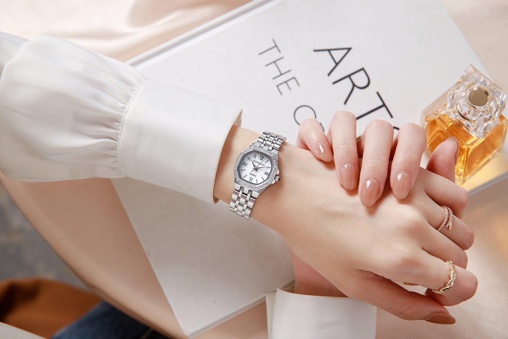 Giordano Analog Watch for Women with Silver Dial, Crystal Studded Bezel, Roman Indices & Stainless Steel Strap GZ-60162-22