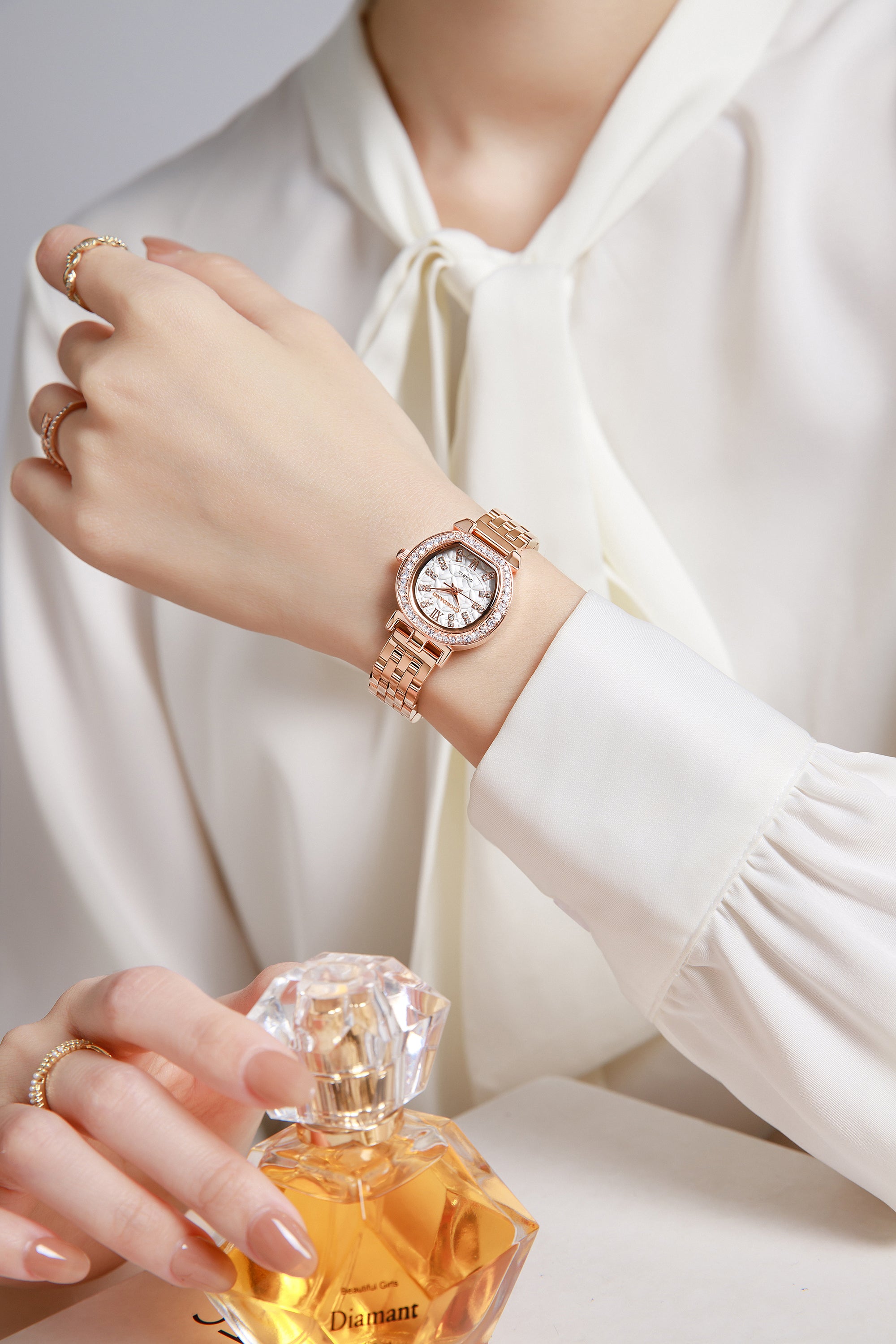 Giordano Analog Quartz Watch for Women with Bangle Set Texured Oval White Dial, Roman Indices, Blue Crown, Crystal Studded Hour Markers and Bezel, Rose Gold Stainless Steel Strap - GZ-60154-11