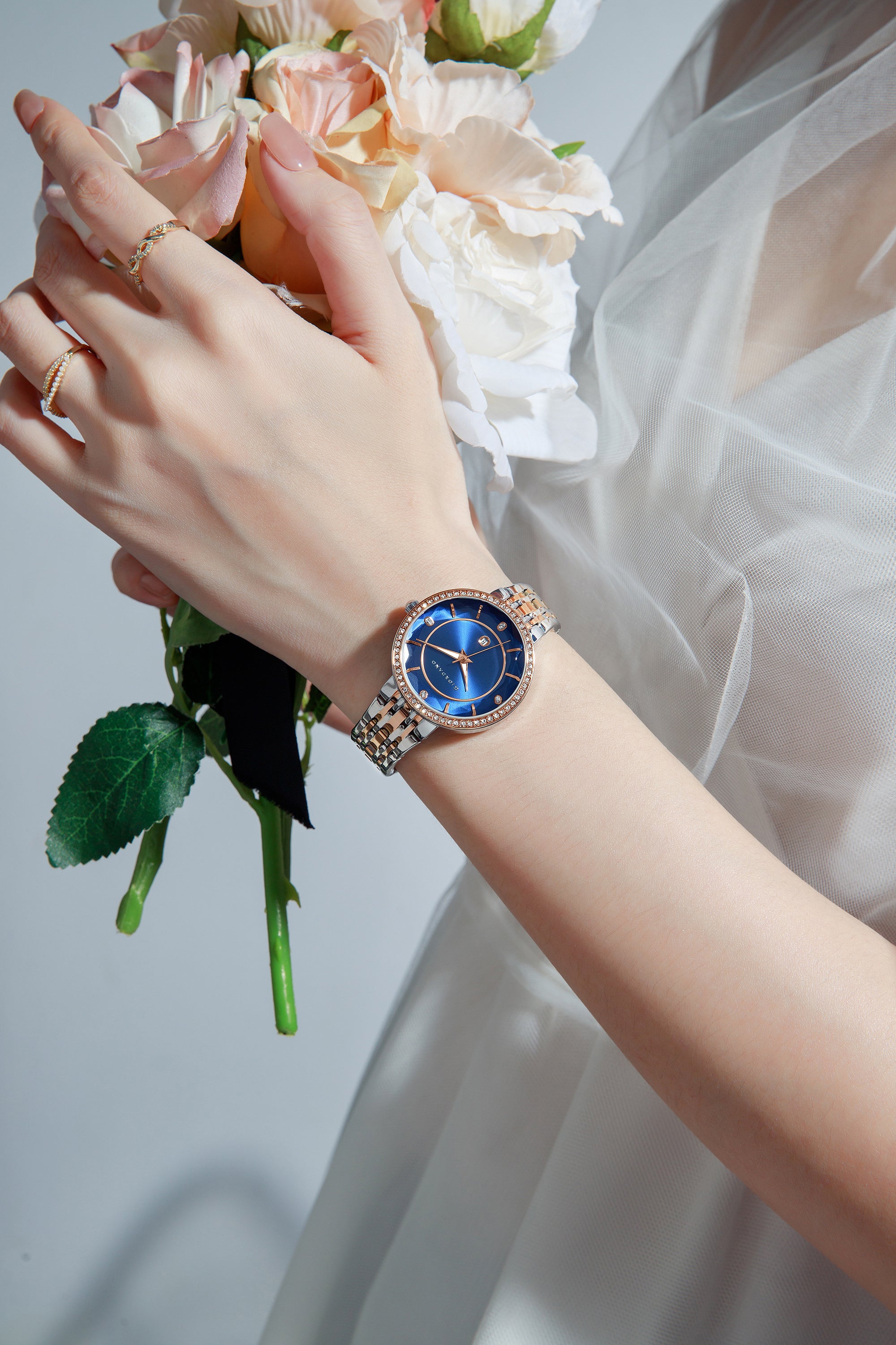 Giordano Analog Quartz Watch for Women with Blue Round Sunray Cut Glass Dial, Date Display, Crystal Hour Markers, Diamond-Studded Bezel and Two-Tone Silver & Rose Gold Stainless Steel Strap - GZ-60110-55