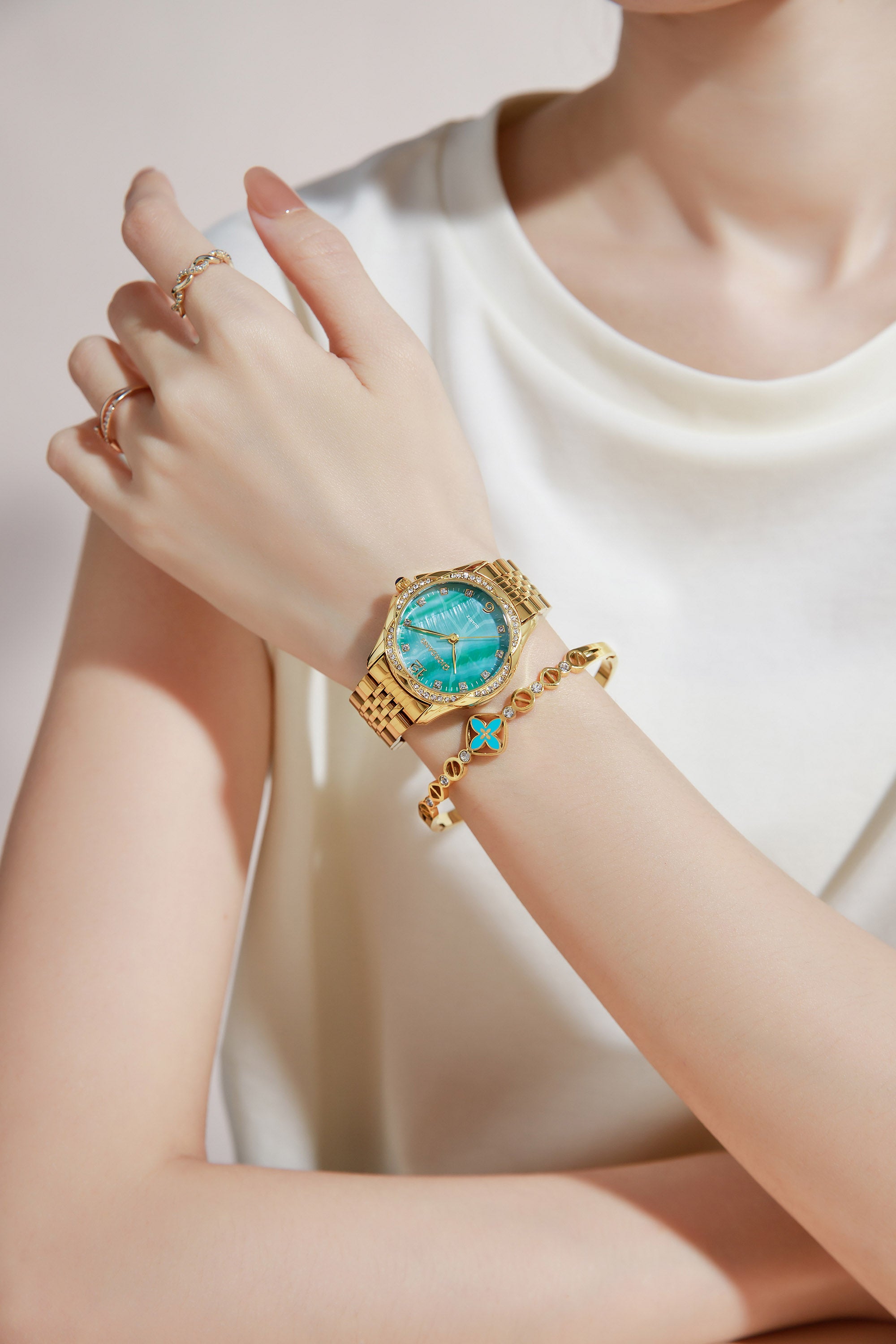 Giordano Analog Quartz Watch for Women with Textured Round Green Dial, Flower shape case, Blue Crown, Crystal studded hour markers and bezel, Gold Stainless Steel Strap - GZ-60157-33