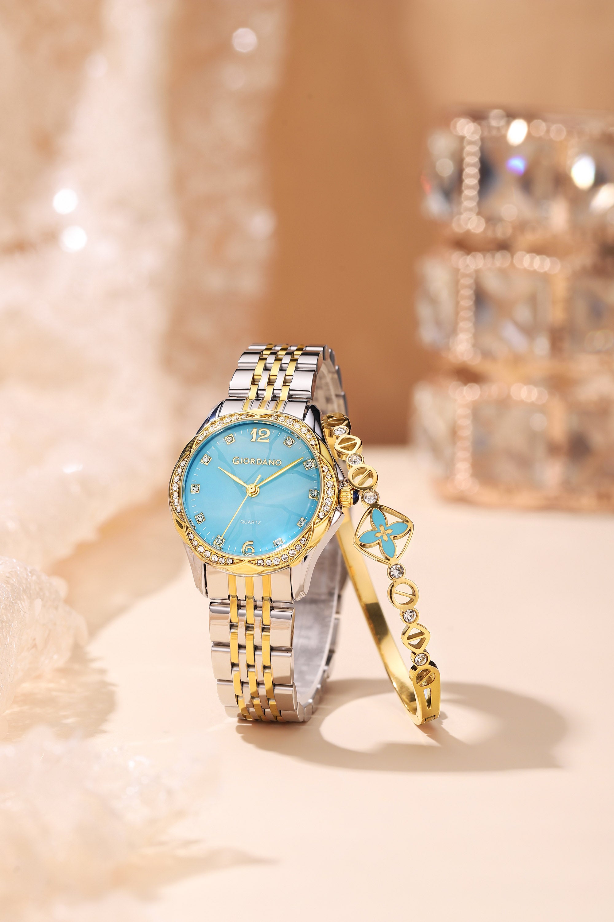 Giordano Analog Quartz Watch for Women with Textured Round Blue Dial, Flower shape case, Blue Crown, Crystal studded hour markers and bezel, Silver and Gold Stainless Steel Strap - GZ-60157-44