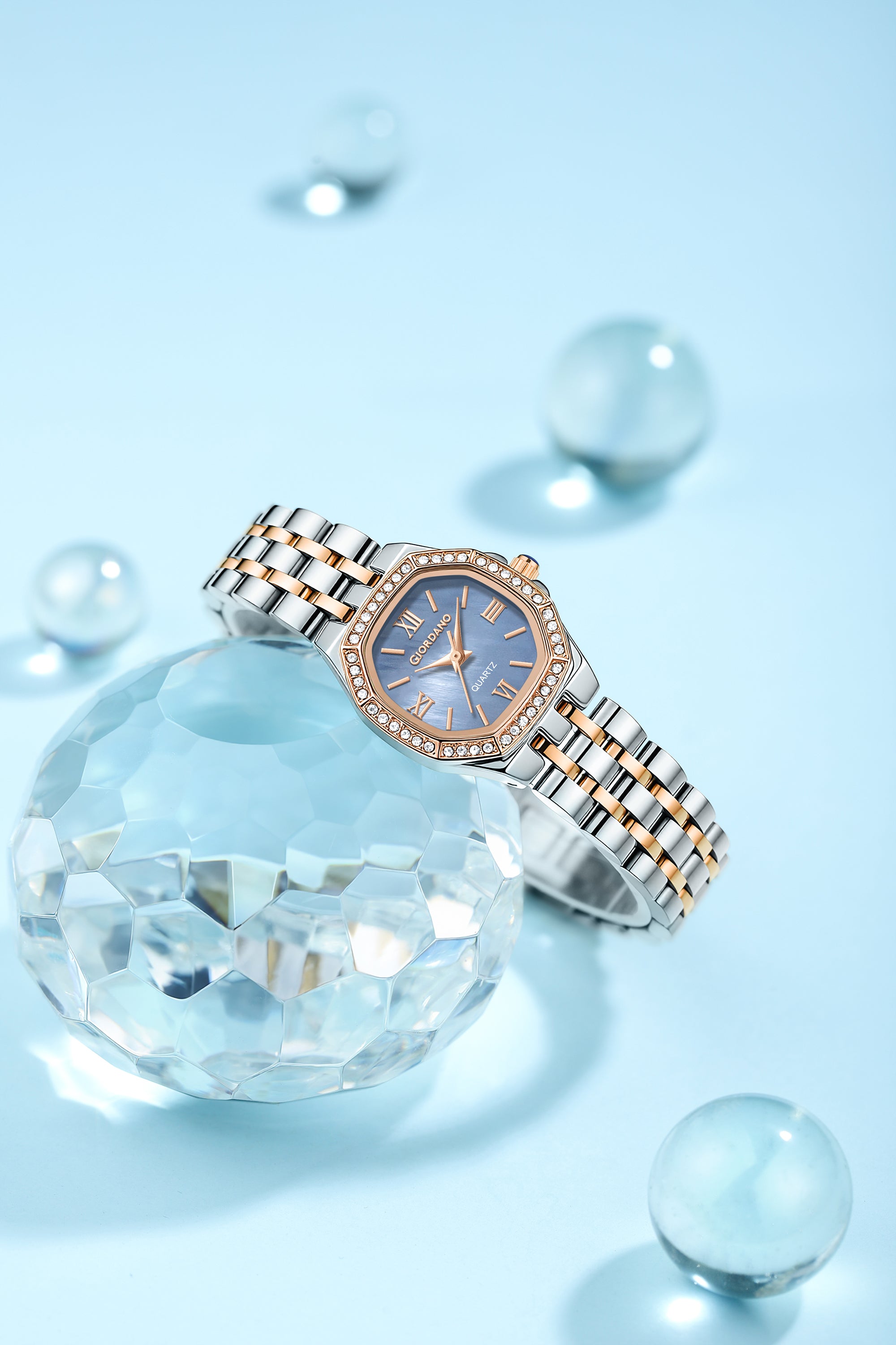 Giordano Analog Quartz Watch for Women with Round Blue Dial, Crystal Studded Bezel, Roman Markers and Stainless Steel Strap - GZ-60162-55