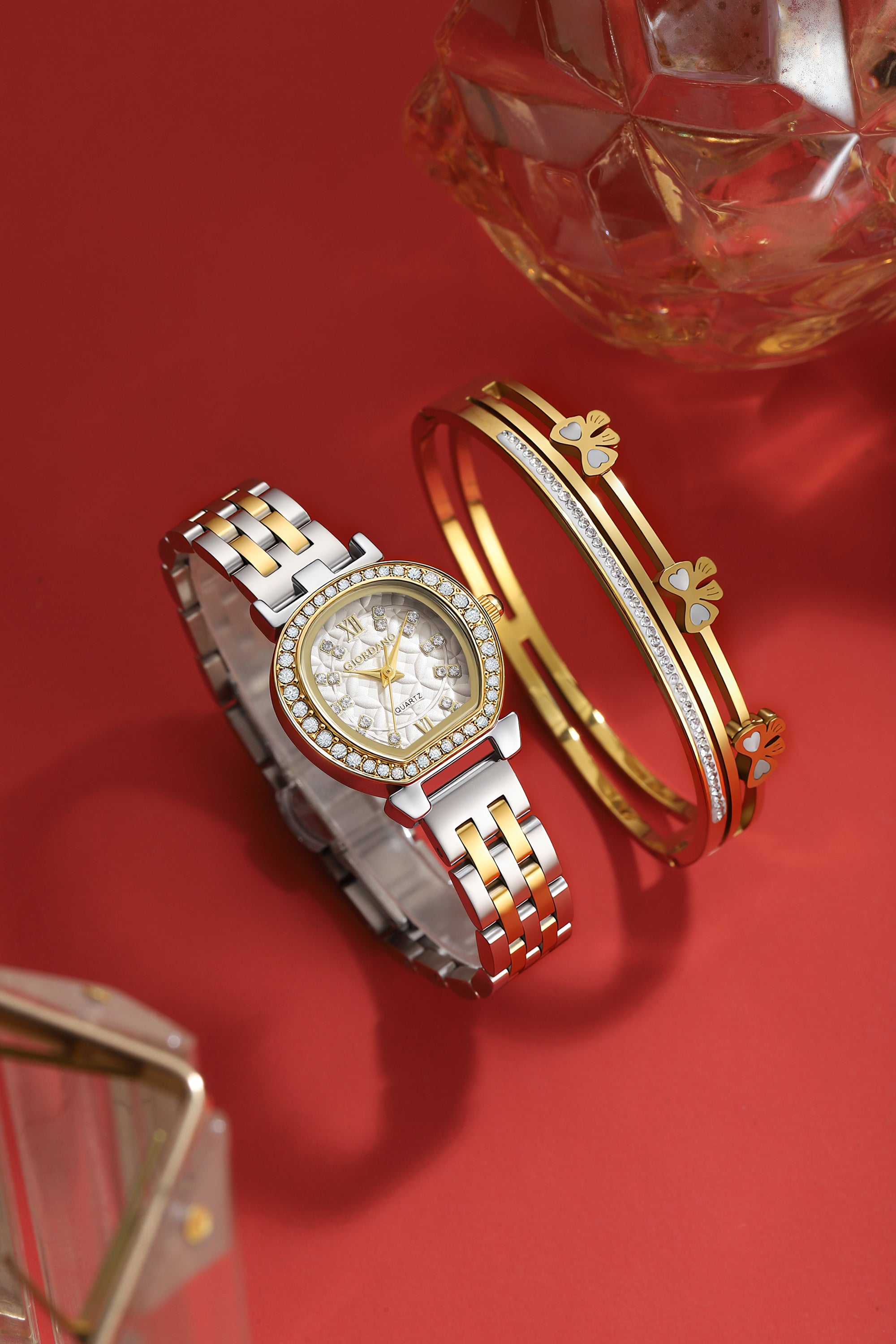 Giordano Analog Quartz Watch for Women with Bangle Set Texured Oval White Dial, Roman Indices, Blue Crown, Crystal Studded Hour Markers and Bezel, Silver and Gold Stainless Steel Strap - GZ-60154-22