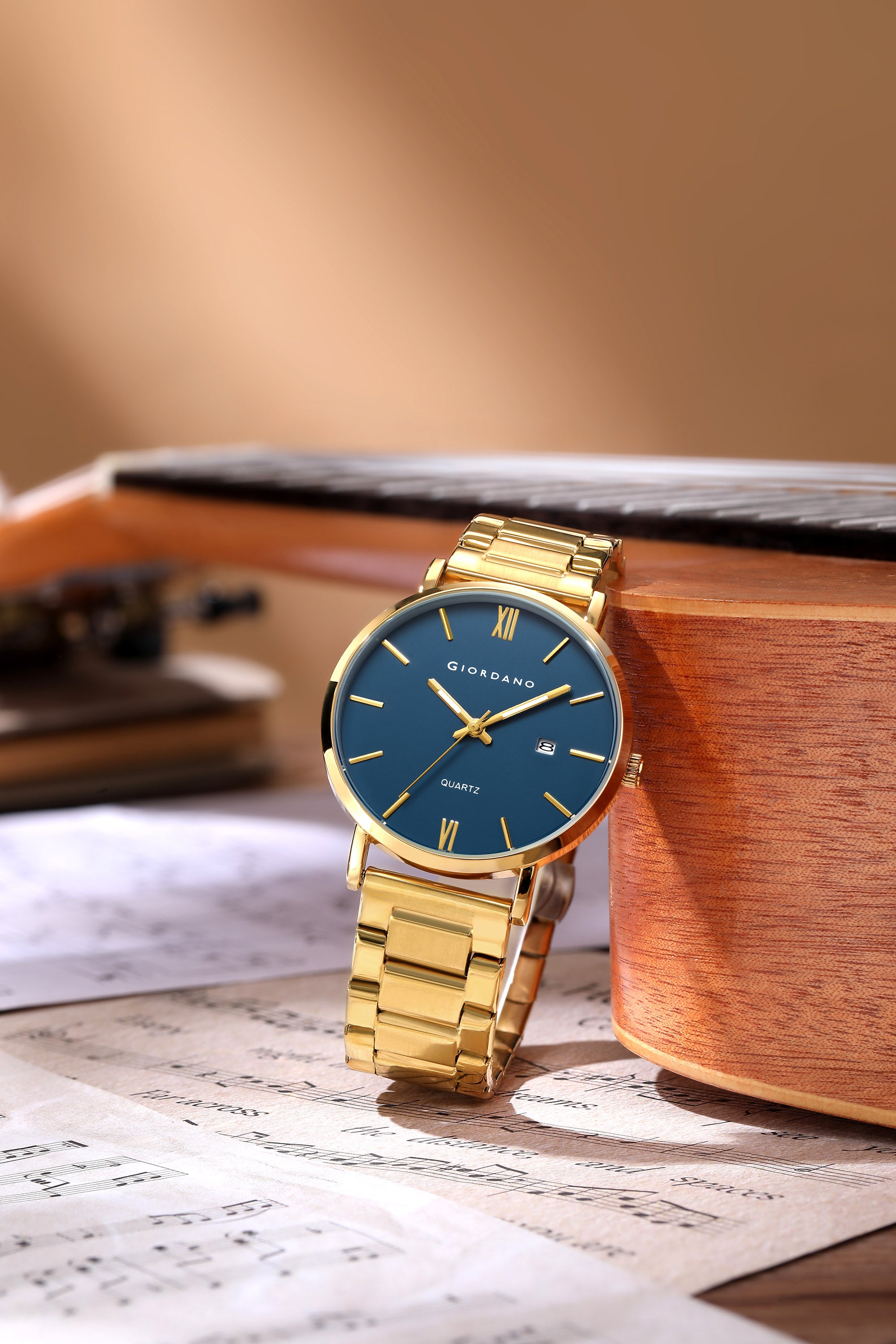 Giordano Analog Quartz Watch for Men with Round Blue Dial, Roman Indices, Date Function, Luminous Hands, Gold Stainless Steel Strap - GZ-50211-44
