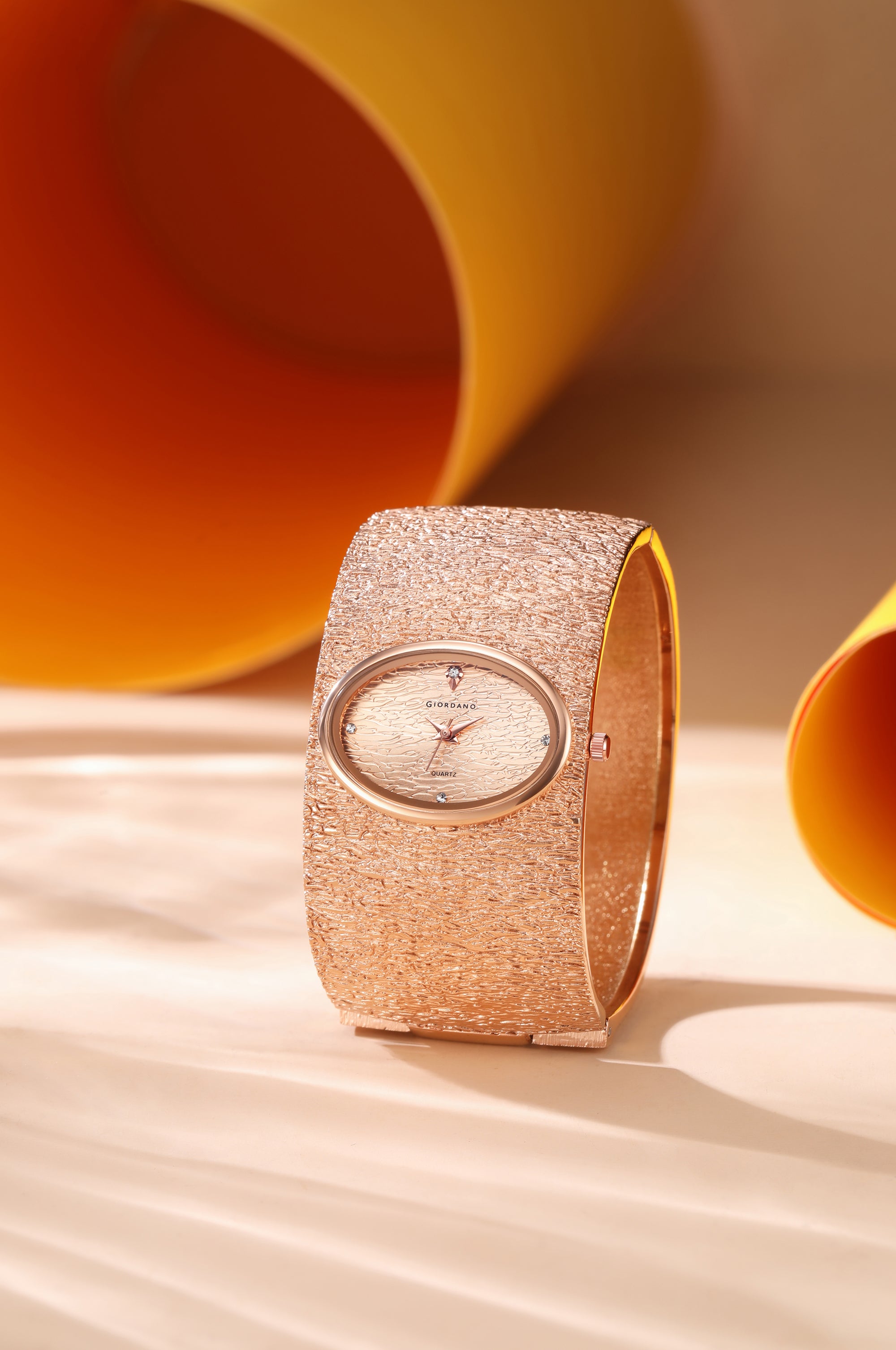 Giordano Analog Quartz Watch for Women with Oval Rose Gold Textured Dial, Crystal Hour Markers, Stainless Steel Bangle Strap - GZ-60171-33