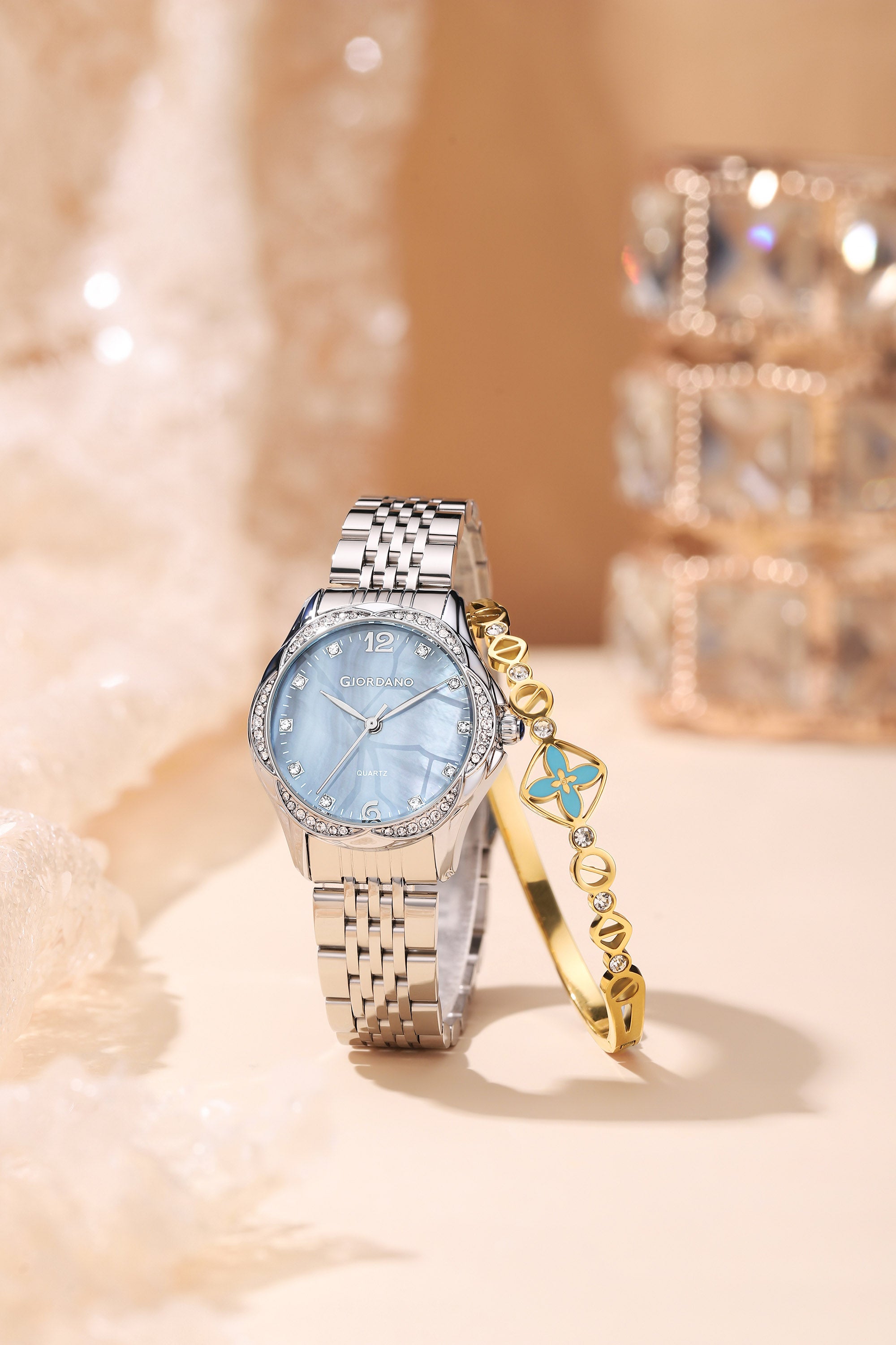 Giordano Analog Quartz Watch for Women with Textured Round Brown Dial, Flower shape case, Blue Crown, Crystal studded hour markers and bezel, Silver Stainless Steel Strap - GZ-60157-22