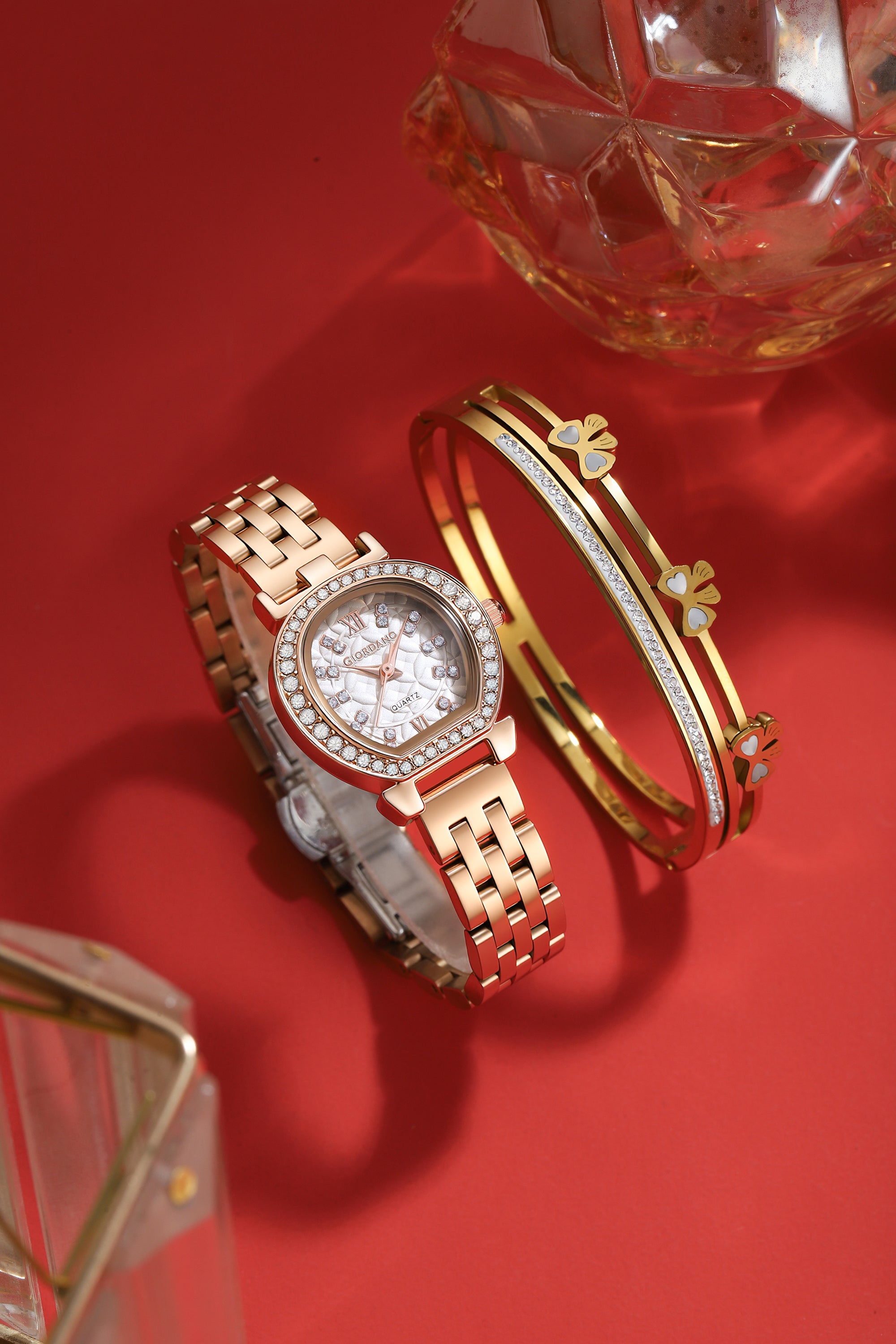Giordano Analog Quartz Watch for Women with Bangle Set Texured Oval White Dial, Roman Indices, Blue Crown, Crystal Studded Hour Markers and Bezel, Rose Gold Stainless Steel Strap - GZ-60154-11
