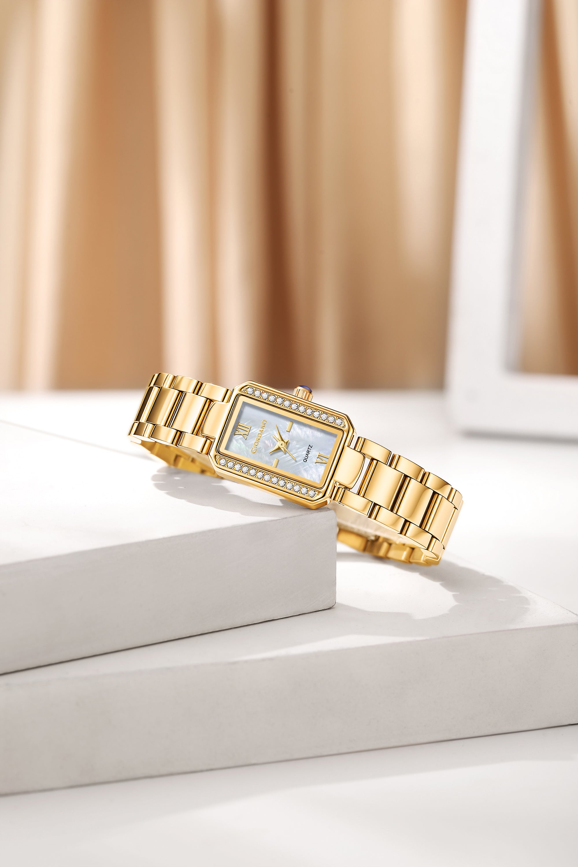 Giordano Analog Quartz Watch for Women with sunray Rectangle White Dial, Roman indices, Crystal studded bezel, Blue Crown, Gold Stainless Steel Strap - GZ-60167-11