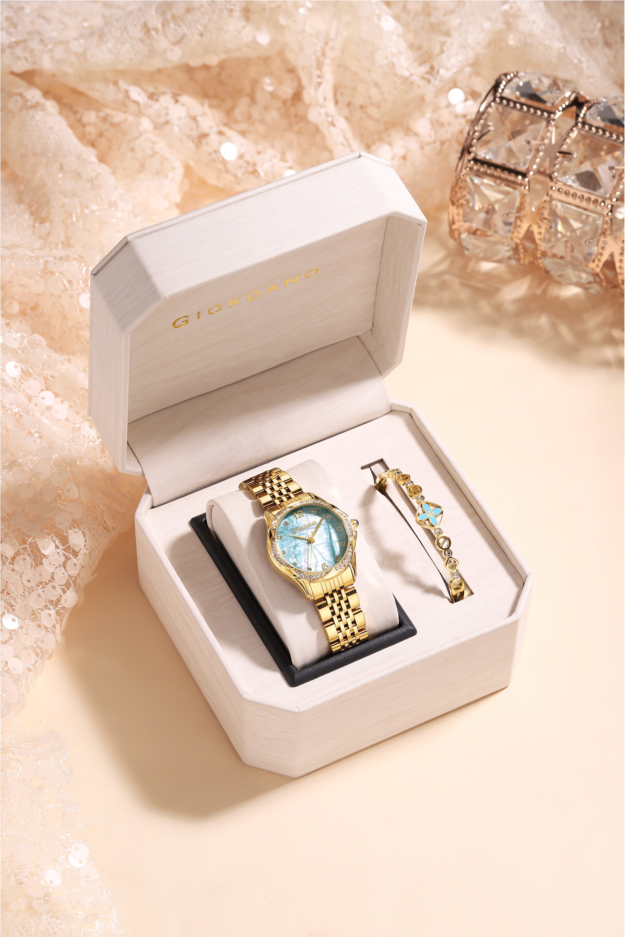 Giordano Analog Quartz Watch for Women with Textured Round Green Dial, Flower shape case, Blue Crown, Crystal studded hour markers and bezel, Gold Stainless Steel Strap - GZ-60157-33