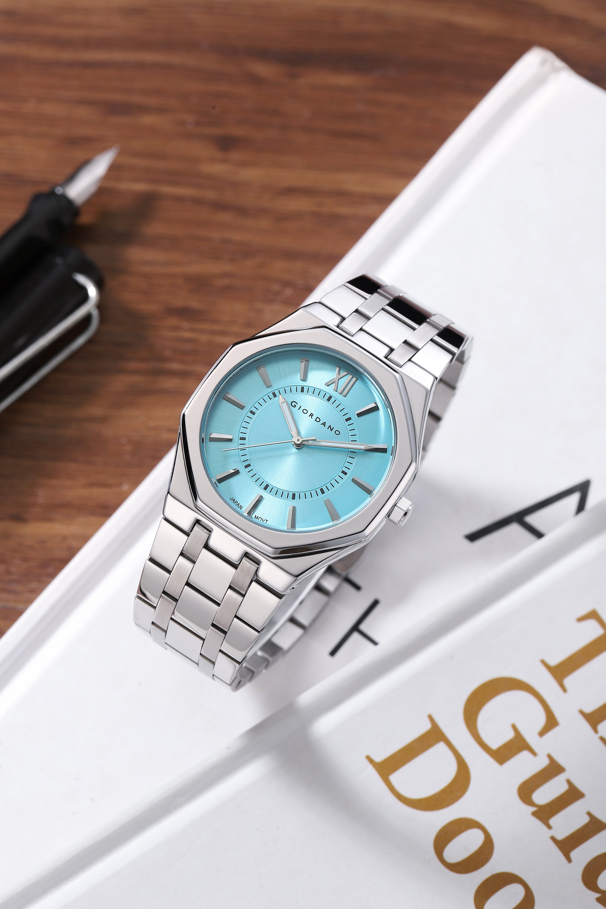 Giordano Analog Quartz Watch for Men with Light Blue Sunray Round Dial, Roman XII & Luminous Hands Markers, Faceted Octagonal Bezel and Silver Stainless Steel Strap - GZ-50191-22