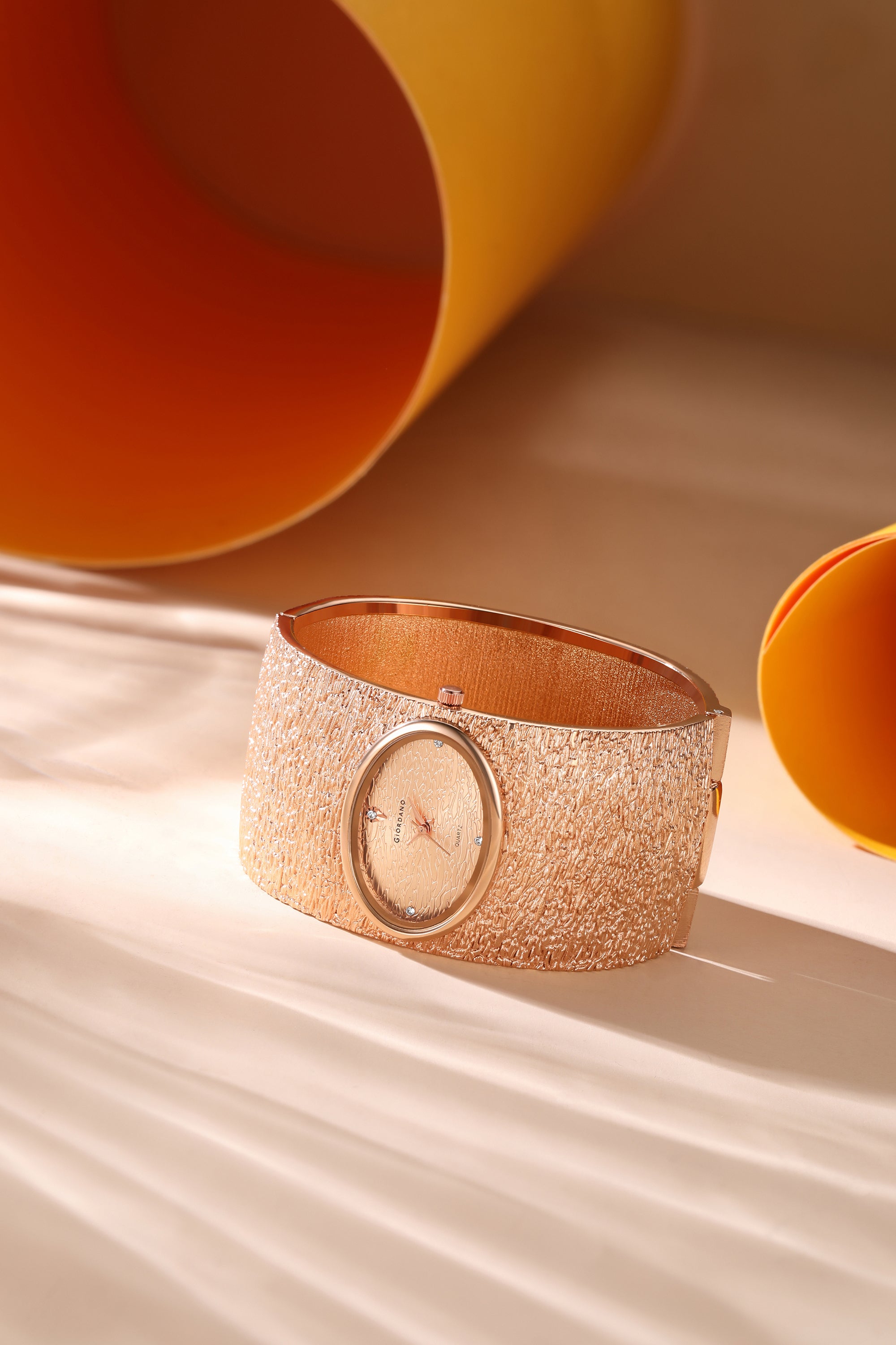 Giordano Analog Quartz Watch for Women with Oval Rose Gold Textured Dial, Crystal Hour Markers, Stainless Steel Bangle Strap - GZ-60171-33