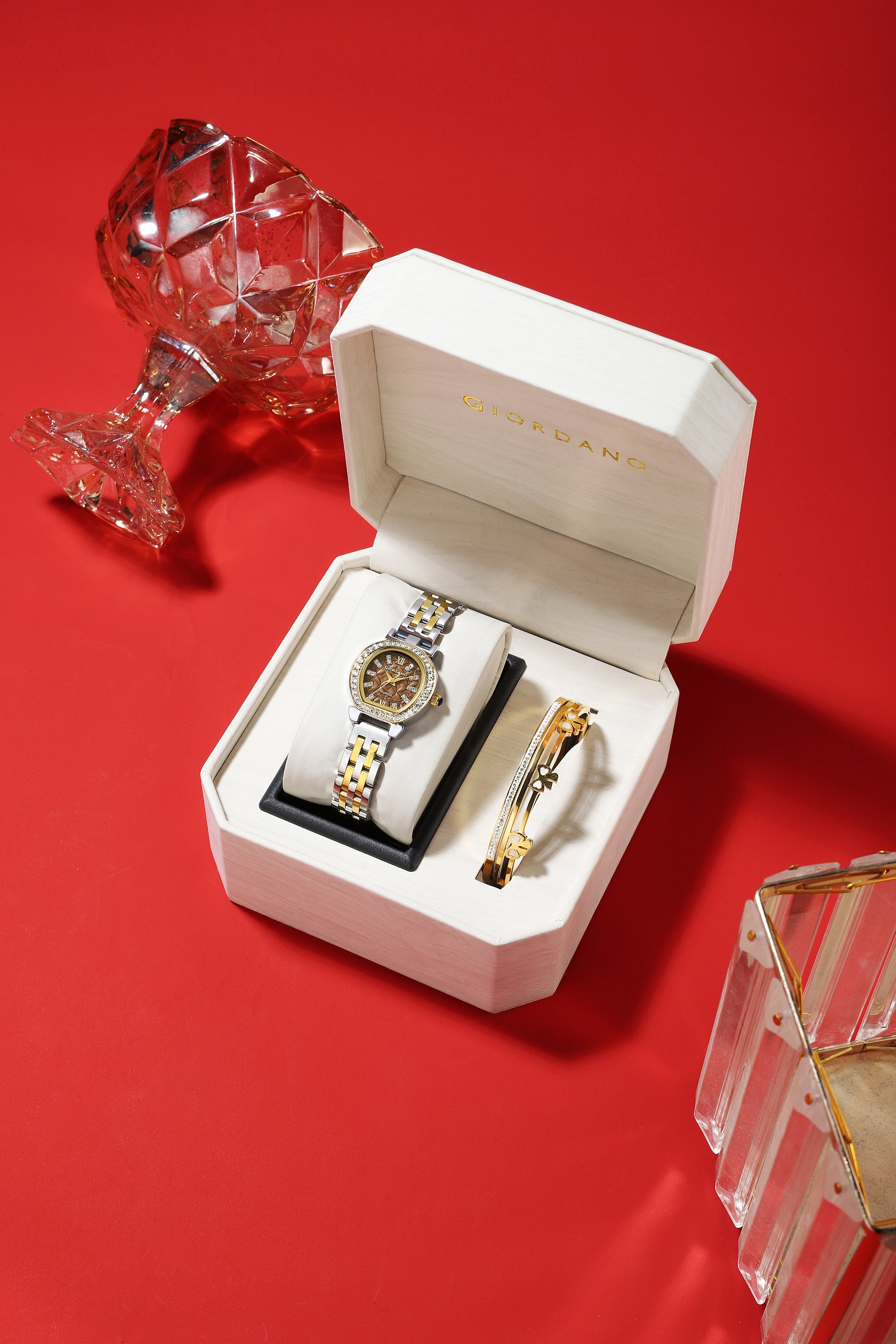 Giordano Analog Quartz Watch for Women with Bangle Set Texured Oval Brown Dial, Roman Indices, Blue Crown, Crystal Studded Hour Markers and Bezel, Silver and Gold Stainless Steel Strap - GZ-60154-33