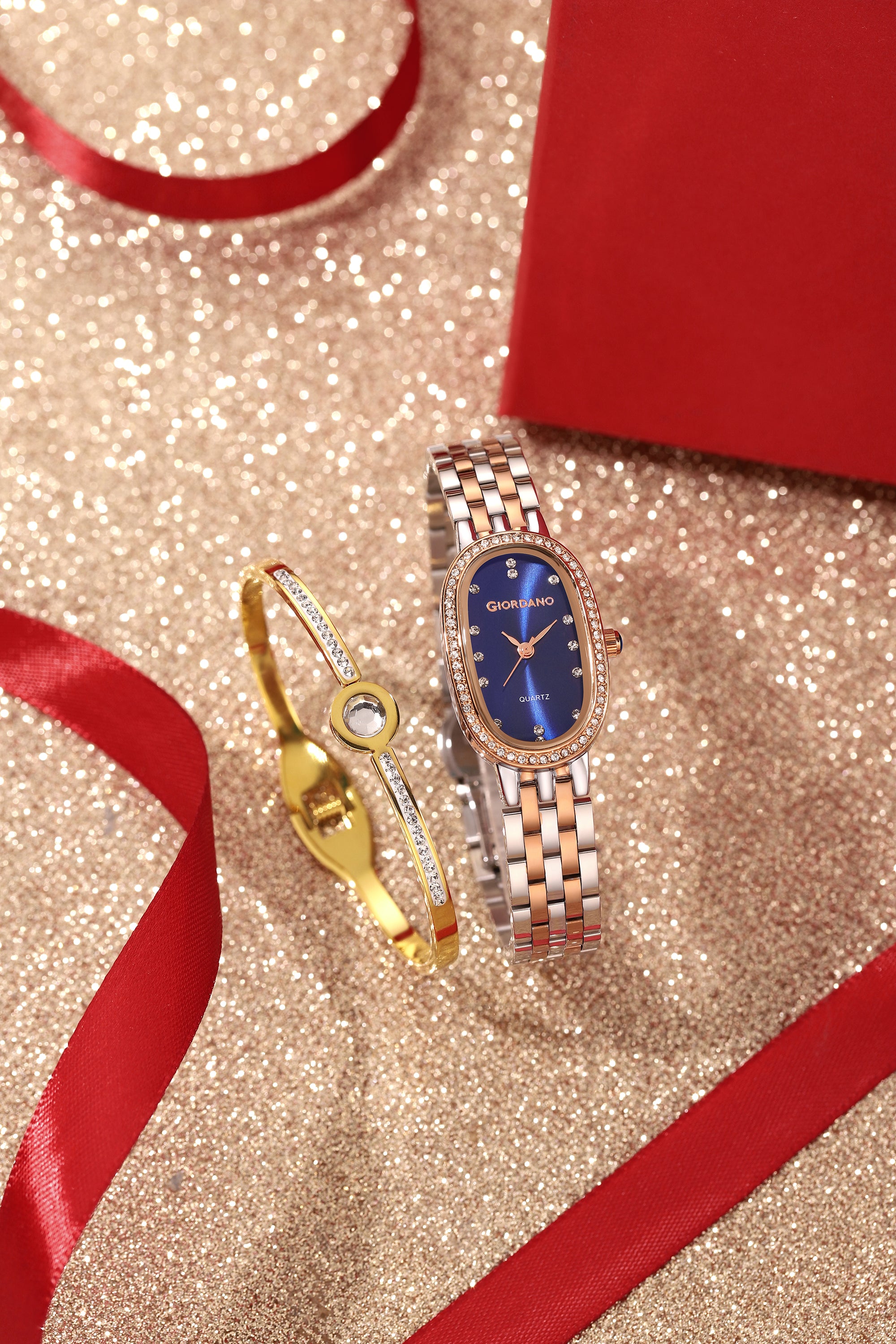 Giordano Analog Quartz Watch for Women with Bangle Oval Blue Dial, Blue Crown, Crystal Studded Hour Markers and Bezel, Silver and Rose Gold Stainless Steel Strap - GZ-60153-44